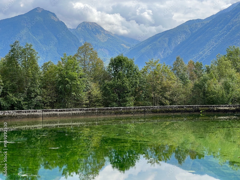 Fototapeta premium Small reservoir Plužna or Pluzensko lake, stream Gljun (Bovec, Slovenia) - Kleiner Stausee Pluzna, Bach Glijun (Bovec, Slowenien) - Akumulacijsko jezero Plužna or Plužensko jezero (Slovenija)