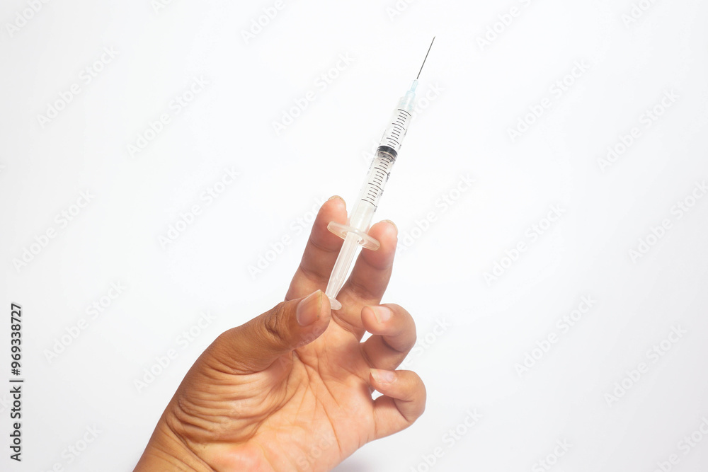 a man using a injector with white isolated a man using a injector with white isolated