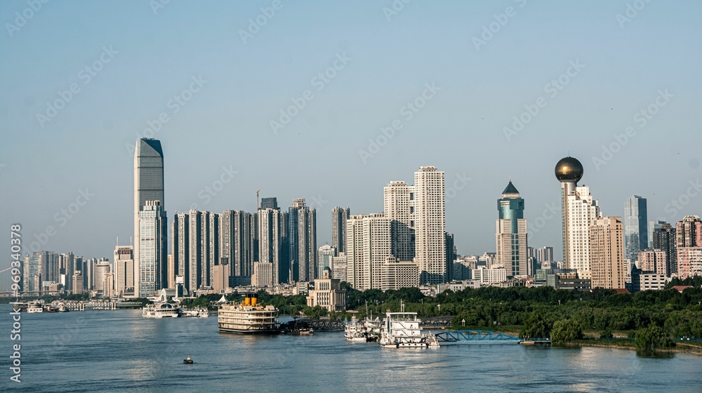 Naklejka premium Wuhan city skyline along the Yangtze River
