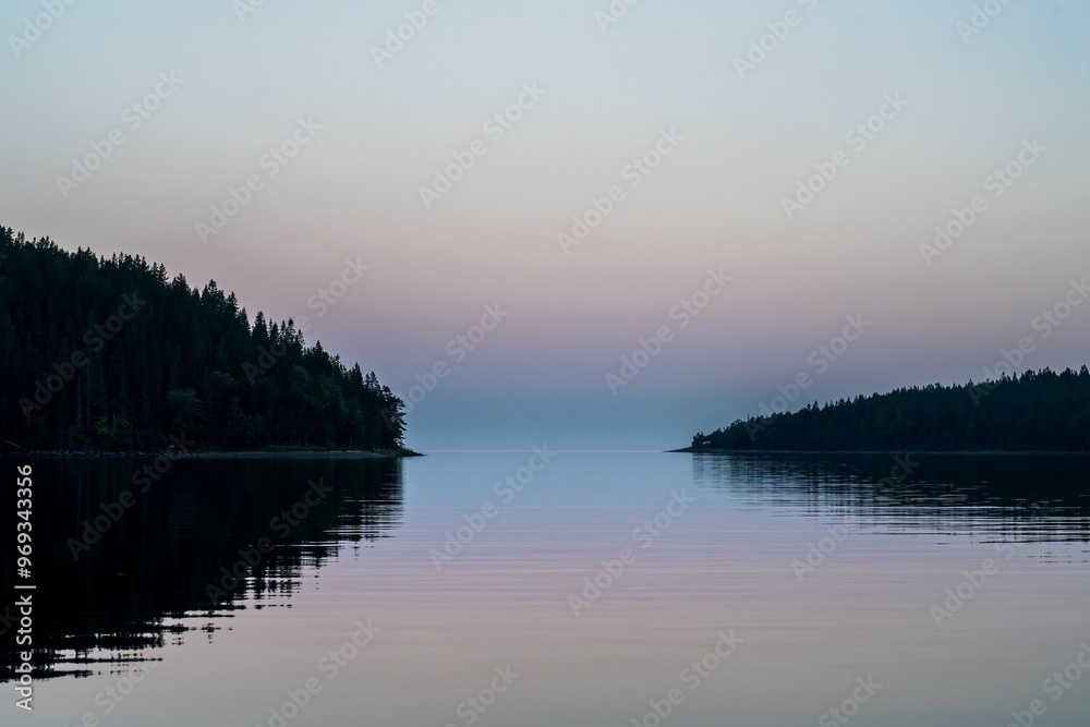 Fototapeta premium Scenic view of High coast archipelago in Sweden at sunset