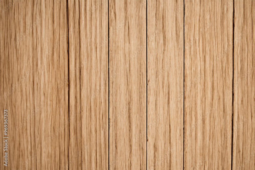 Close-up of a natural woodgrain texture with vertical planks. Close-up of a natural woodgrain texture with vertical planks.