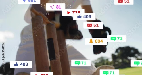 Animation of social media icons with growing numbers over caucasian male cricket player photo