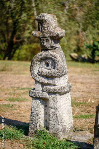 Obraz na płótnie The figure of the ancient gods on the stones in the autumn park. Ukraine. Scythian culture w salonie