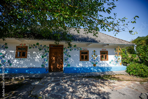 Obraz na płótnie Ukrainian house painted with floral patterns in ancient technique w salonie