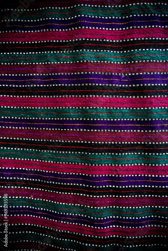 Obraz na płótnie Ornament of traditional Ukrainian multicolored colorful rug. Hutsul ethnic woven smooth hand-woven wool rug with geometric ornaments background and texture. Detail of authentic local motif carpet. w salonie