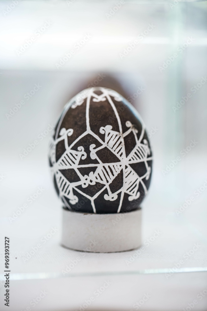 Painted traditional Ukrainian Easter egg - Pysanka. Military style. War in Ukraine