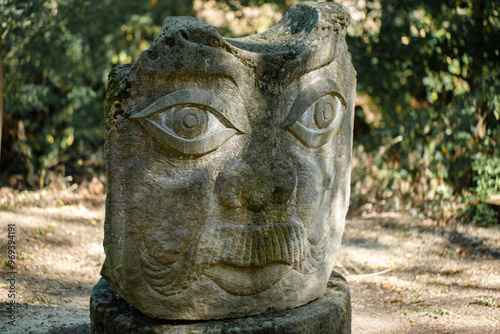 Obraz na płótnie The figure of the ancient gods on the stones in the autumn park. Ukraine. Scythian culture w salonie