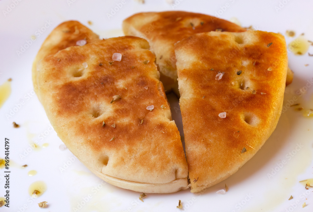 white bread with olive oil and coarse salt and oregano, bread with olive oil, appetizer, fried bread with olive oil white bread with olive oil and coarse salt and oregano, bread with olive oil, appetizer, fried bread with olive oil