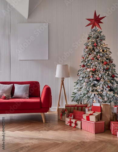 Christmas-tree decoration, gifts and ornament in a living room with modern furniture, red sofa, wooden floor and cozy atmosphere