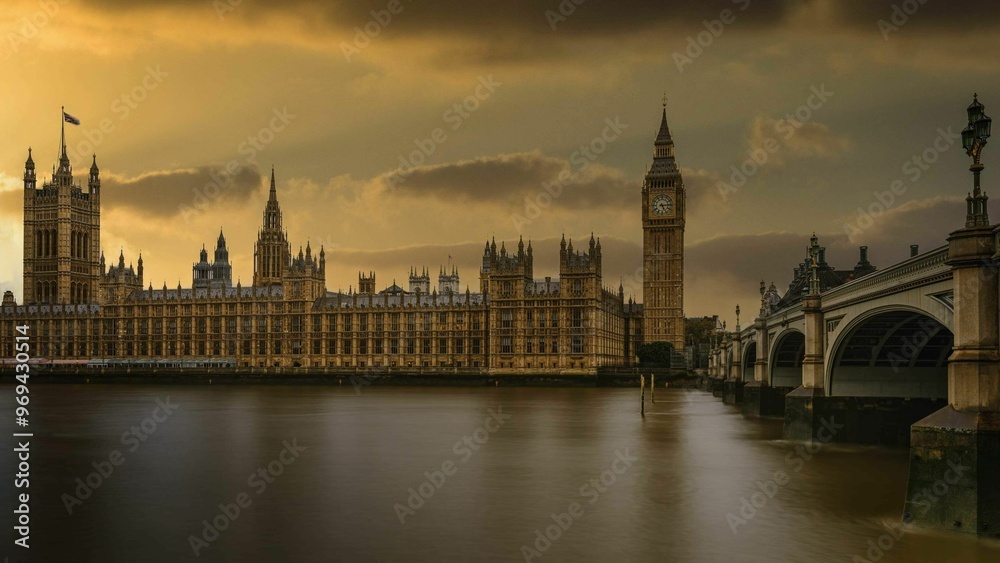 Stunning view of the Big Ben at sunset in London, with the River Thames in the foreground Stunning view of the Big Ben at sunset in London, with the River Thames in the foreground