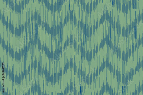 Seamless green and blue ikat zigzag pattern. Traditional geometric design for textiles, wallpapers and home decor. Handwoven tribal style illustration.