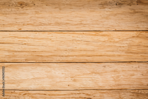 Close-up of light brown woodgrain background with four horizontal planks.