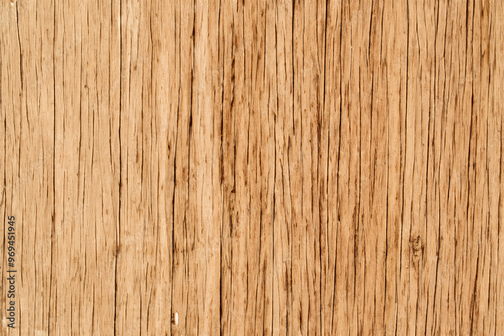 Close-up of a rustic wooden plank with natural wood grain and cracks. Close-up of a rustic wooden plank with natural wood grain and cracks.