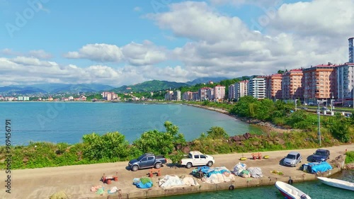 Boats are parked on the shore a. photo