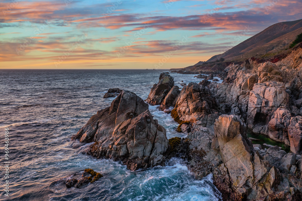 Obraz premium Beautiful landscape of Pacific Ocean coast along Highway 1 and Big Sur, aerial view, sunset, sunrise, fog. Concept, travel, vacation, weekend