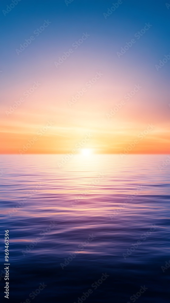 Fototapeta premium Beautiful sunrise over calm ocean water, showcasing vibrant colorful sky and tranquil sea. Perfect for backgrounds and inspirational uses.