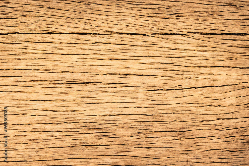 Close up of weathered wooden texture with a natural grain pattern. Close up of weathered wooden texture with a natural grain pattern.