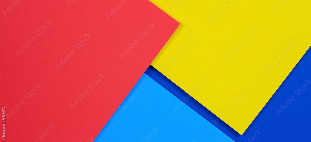 Abstract colored paper texture background with minimal geometric shapes. Creative abstract blue, red and yellow color layout composition