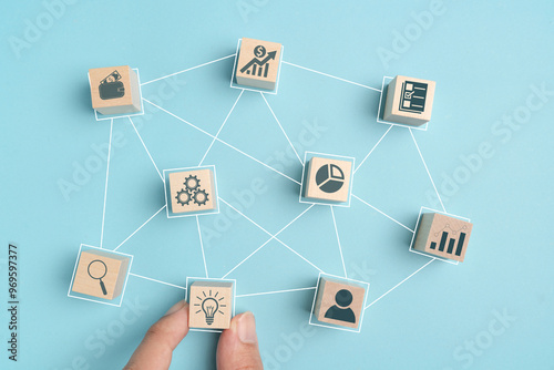 wood block with icon business strategy and Action plan, Goal and target, success and business target concept, project management, company strategy development.