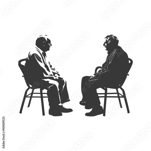 Two men sitting in chairs facing each other silhouettes
