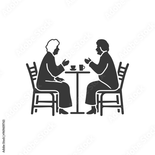 Two people sitting at a table with drinks talking
