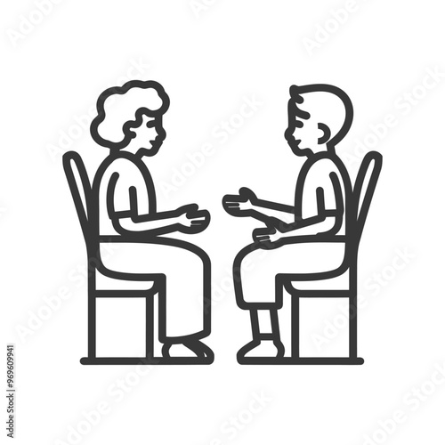 Two People Sitting Opposite Each Other in Chairs