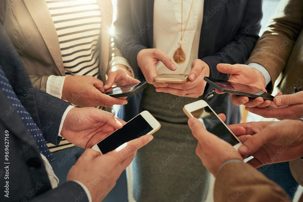 Business people, hands and phone with network for data sync, sharing or communication at office. Closeup, group or employees on mobile smartphone for social media, texting or chatting at workplace Business people, hands and phone with network for data sync, sharing or communication at office. Closeup, group or employees on mobile smartphone for social media, texting or chatting at workplace