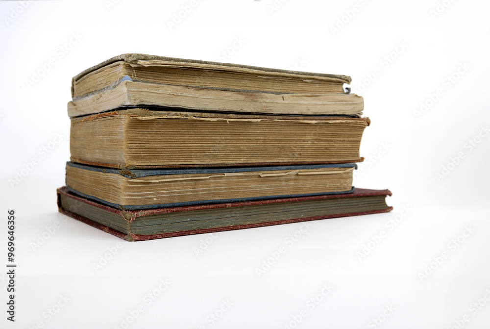 Stack of old books on white background. Stack of old books on white background.