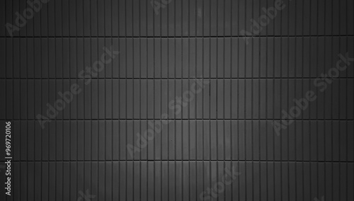 close up image of dark black ceramic clay wall tiles use as background with blank space for design. interior wall finishing material. metro tiles background. subway brick in vertical pattern. © WONGSAKORN
