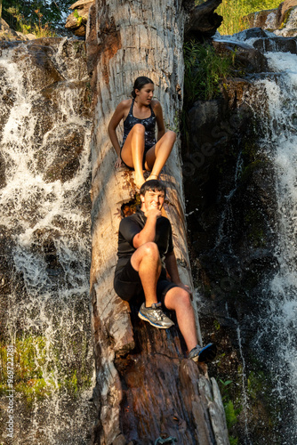 jumping in a waterfall  photo