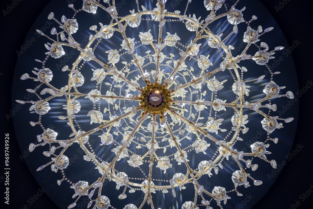 Fototapeta premium Close-up of an ornate chandelier with intricate crystal designs
