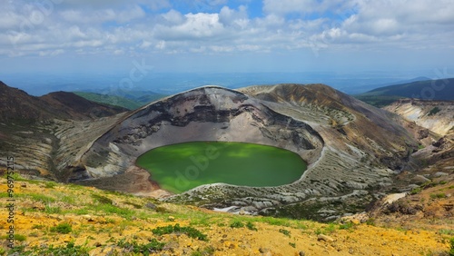 фотографія Scenic view of the volcanic crater lake Okama on the top of Mt