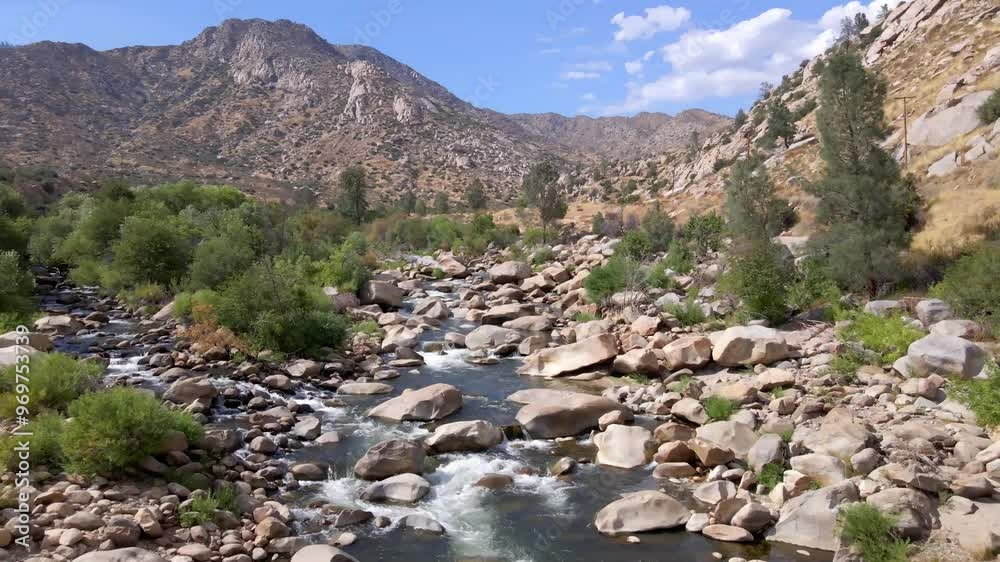 Catching the beautiful Kern River flow as we gently fly over the water and pass over the rocks.