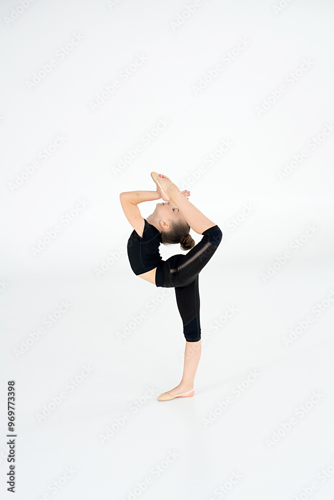 Cute little girl doing handstand indoors. Gymnastics Cute little girl doing handstand indoors. Gymnastics