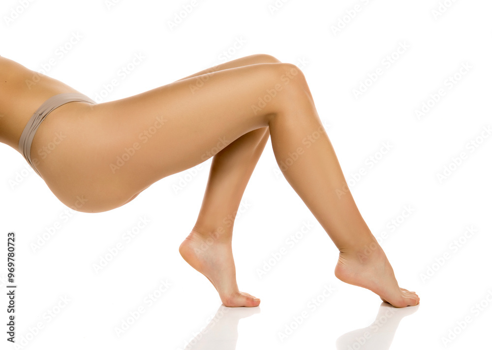 Legs, feet and skin with beauty of woman, epilation and glow on white studio background. waxing and dermatology with cosmetic skincare. Legs, feet and skin with beauty of woman, epilation and glow on white studio background. waxing and dermatology with cosmetic skincare.