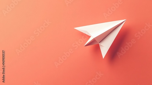 Wallpaper Mural A single white paper airplane flying across a bright coral background, symbolizing joy and freedom with minimalist design and clean shadows Torontodigital.ca