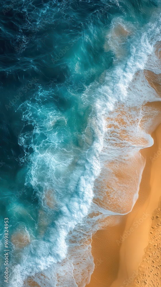 dramatic aerial view of powerful ocean waves meeting a pristine beach turquoise water contrasts with white foam creating an abstract natural pattern dramatic aerial view of powerful ocean waves meeting a pristine beach turquoise water contrasts with white foam creating an abstract natural pattern
