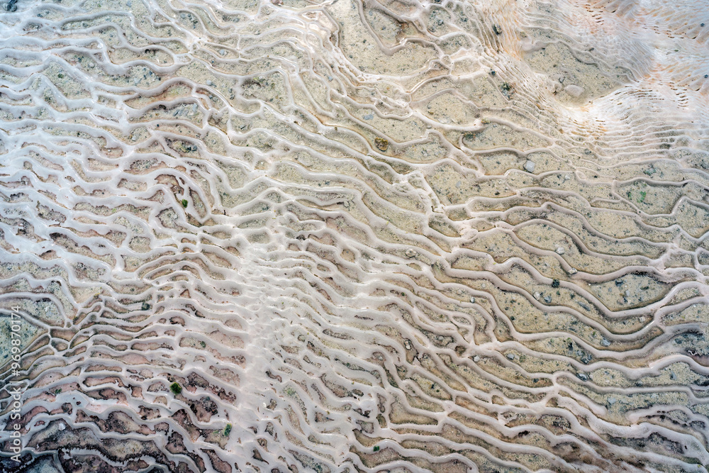 A close-up of Pamukkale's unique geological formations, featuring intricate patterns of white calcium carbonate deposits.