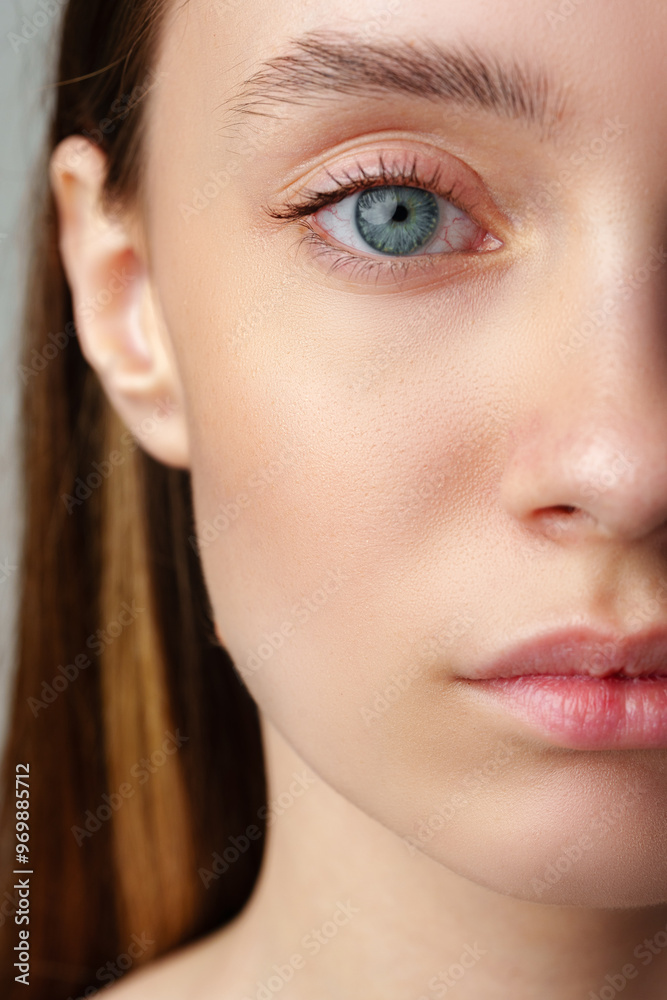 Obraz premium Close Up of Woman's Blue Eyes With Natural Makeup