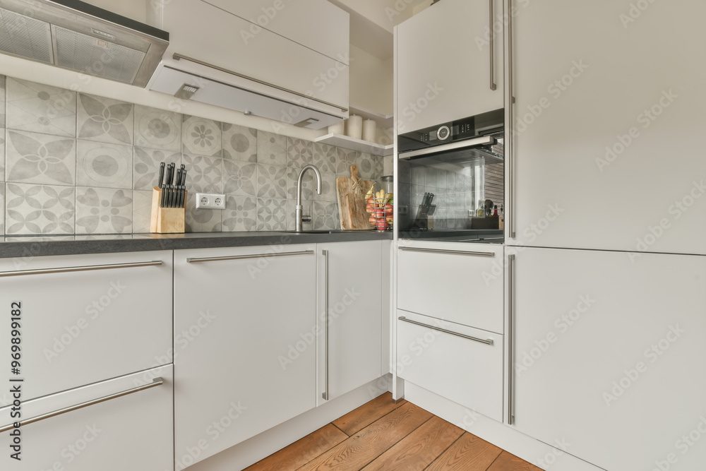 Modern kitchen interior with stylish white cabinets Modern kitchen interior with stylish white cabinets