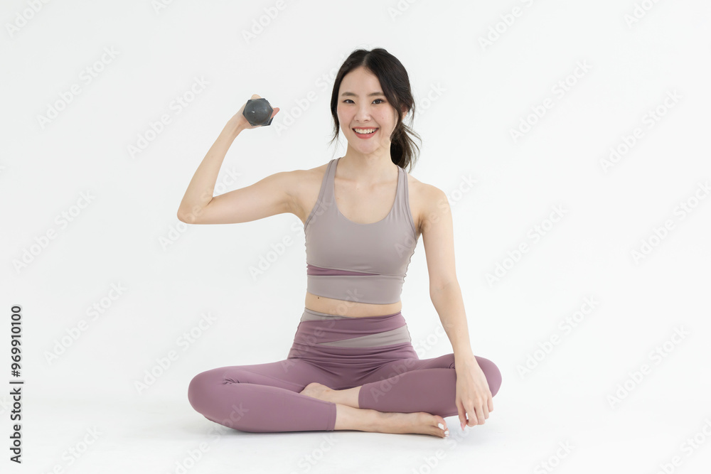 Isolated asian woman with dumbbell exercise on white background Isolated asian woman with dumbbell exercise on white background