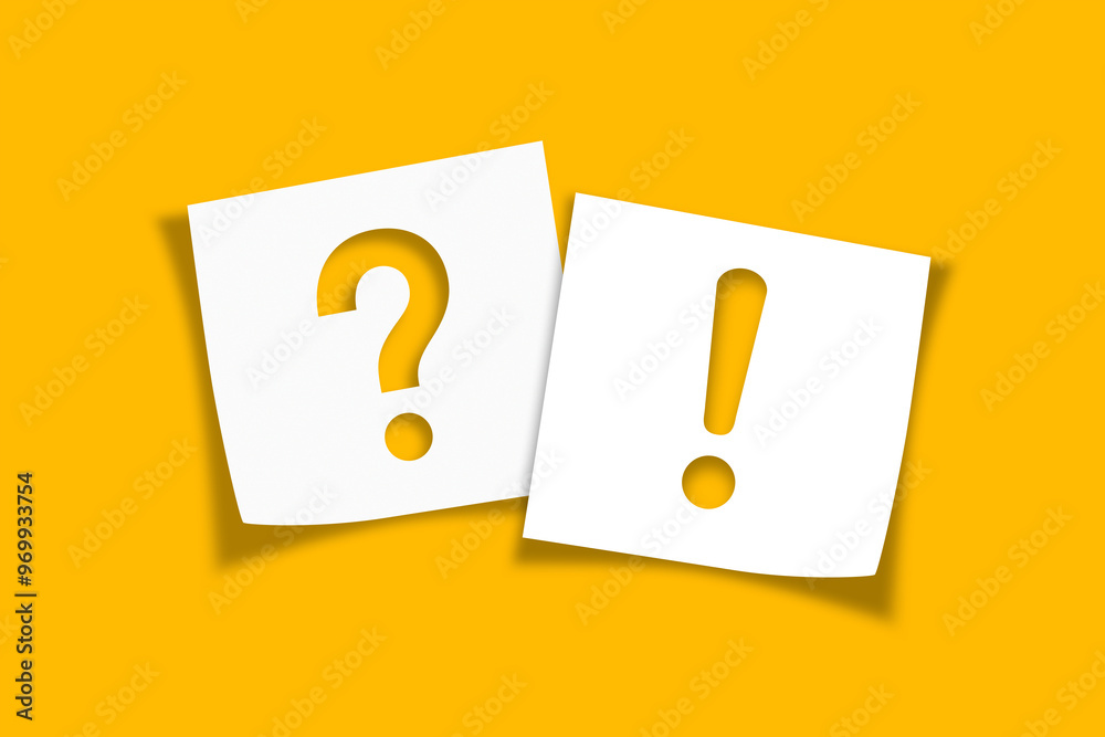 Note paper with exclamation mark and question mark on yellow background Note paper with exclamation mark and question mark on yellow background