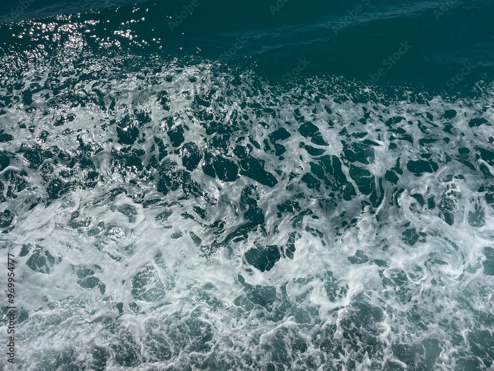 Sea spray waves with rich deep blue and turquoise tones Gulf of Thailand Sea spray waves with rich deep blue and turquoise tones Gulf of Thailand