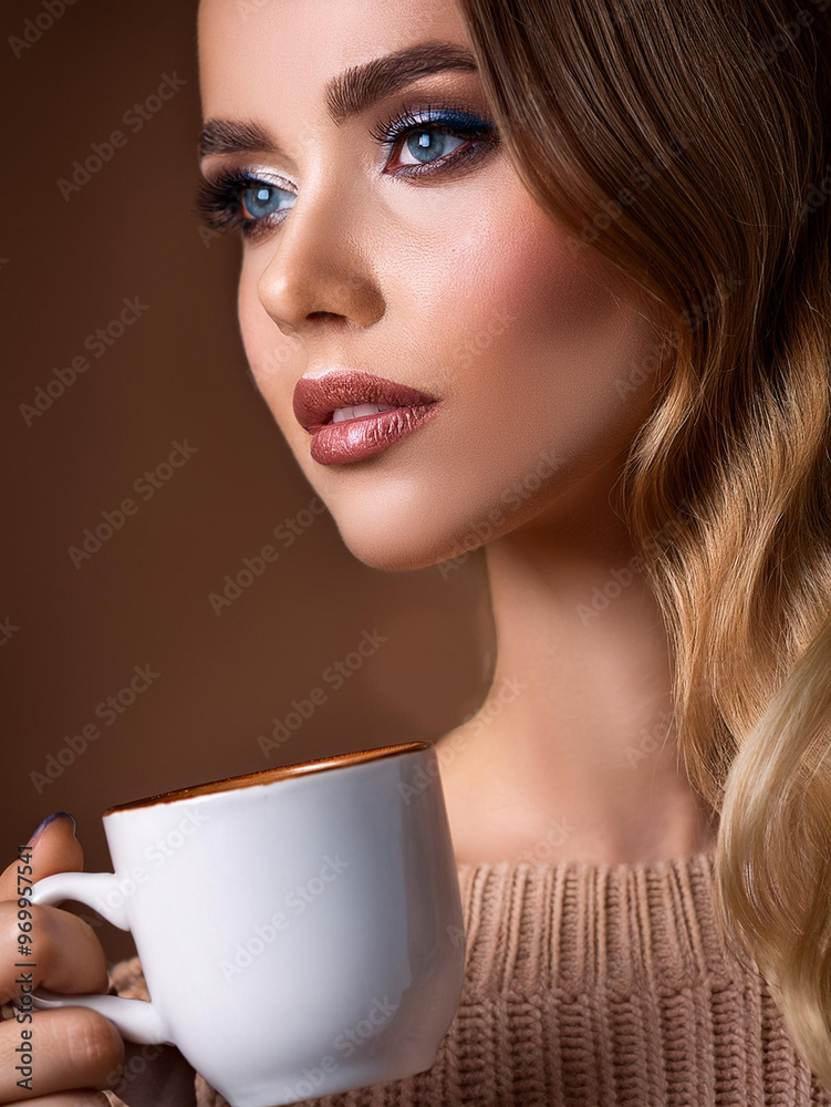 A lovely woman sipping from a coffee cup, radiating warmth and elegance in a serene environment. Autumn makeup. A lovely woman sipping from a coffee cup, radiating warmth and elegance in a serene environment. Autumn makeup.