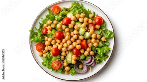 Fresh chickpea salad with tomatoes, cucumbers, and greens on a white plate