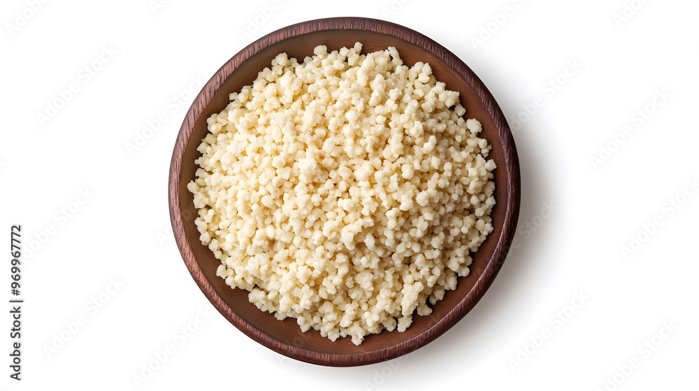 Wooden bowl of israeli couscous isolated on white background Wooden bowl of israeli couscous isolated on white background