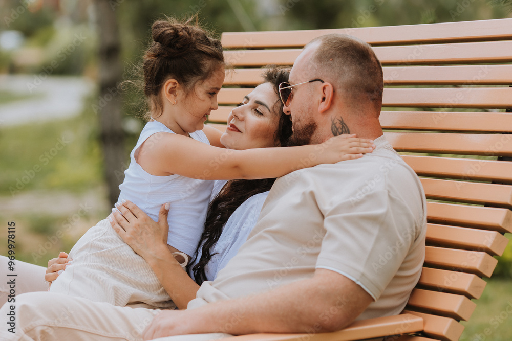 happy family is relaxing in the city park happy family is relaxing in the city park