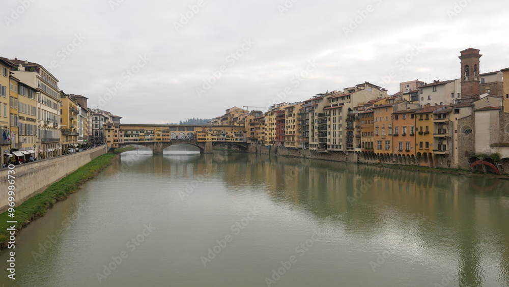 Florence, Italy - decembre 27 2024: Sunny Tuscany with iconic Ponte Vecchio, Florence skyline historic architecture, Arno River reflections. A colorful blend of Renaissance culture, medieval landmarks Florence, Italy - decembre 27 2024: Sunny Tuscany with iconic Ponte Vecchio, Florence skyline historic architecture, Arno River reflections. A colorful blend of Renaissance culture, medieval landmarks