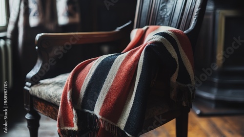 A vintage football scarf draped over a chair, representing a long-standing fan dedication.