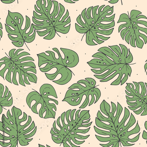 Seamless pattern with monstera leaves on color background. Tropical leaves on beige background
